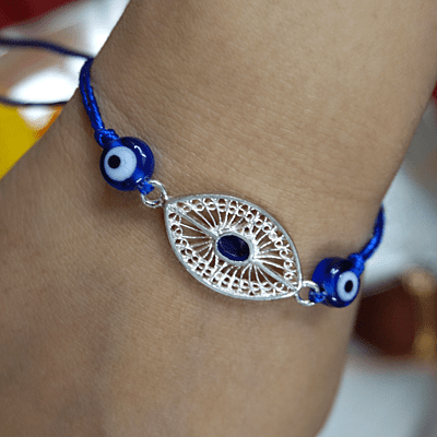 Silver evil eye rakh