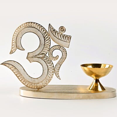 The sacred filigree Om with Diya The sacred filigree Om with Diya