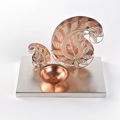 Dazzling filigree paisley diya Dazzling filigree paisley diya