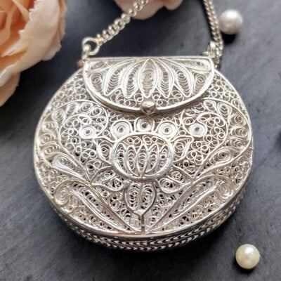 Intricate Silver Coin Pouch collection