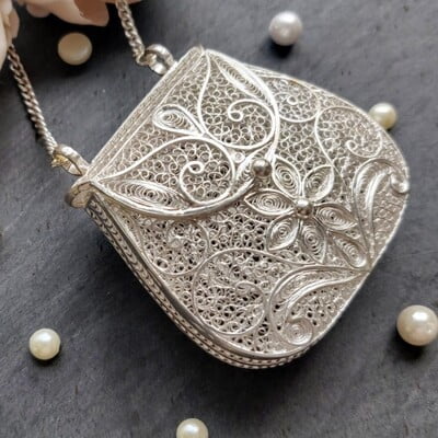 Intricate Silver Coin Pouch collection